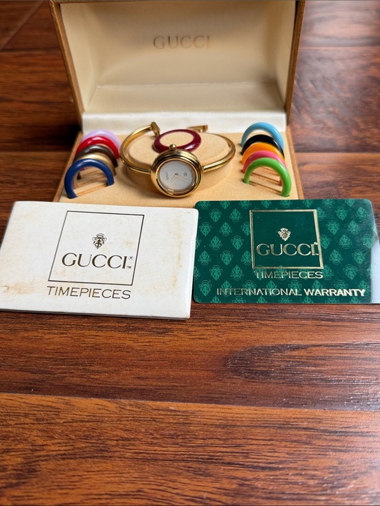 Gucci Accessories - Gucci Gold Bangle Watch with Interchangeable Colorful Bezels